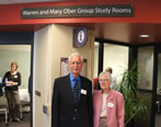Warren and Mary Ober standing in front of the new group study rooms